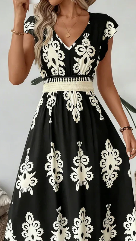 CANDELA | Vestido maxi barroco con escote en V